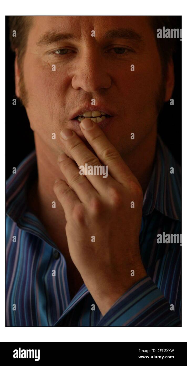 how many cigarettes did val kilmer smoke Val Kilmer in London to promote his new film Wonderlandpic David Sandison  6/5/2004 Stock Photo