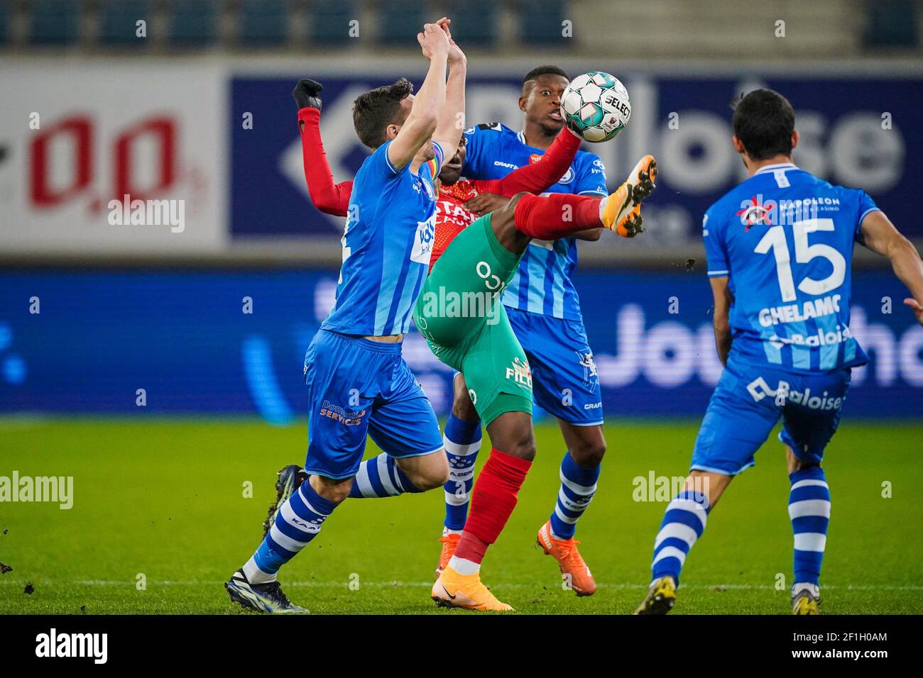 GENT, BELGIUM - MARCH 8: Sven Kums of KAA Gent, Fashion Junior Sakala ...