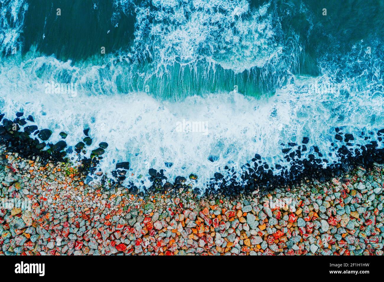 Aerial view of sea waves and rocky coast Stock Photo - Alamy