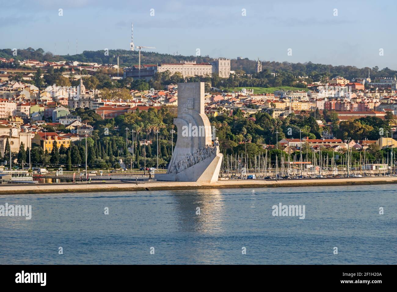 Lisbon, Portugal -  November 7, 2019: Northern bank of the Tagus River with Padrao dos Descobrimentos (Monument of the Discoveries) Stock Photo