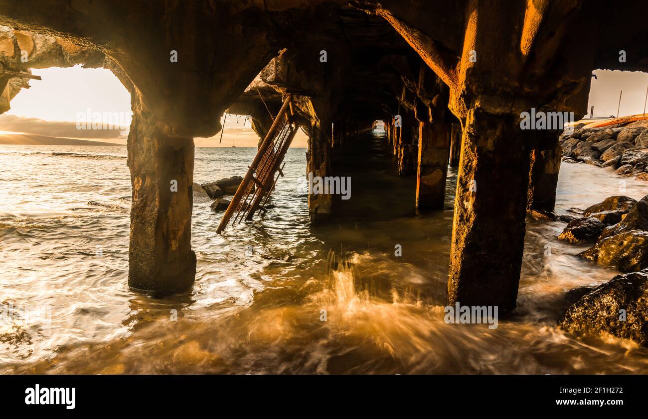 Sunset Under The Historic Mala Wharf, Lahaina, Maui, Hawaii, USA Stock