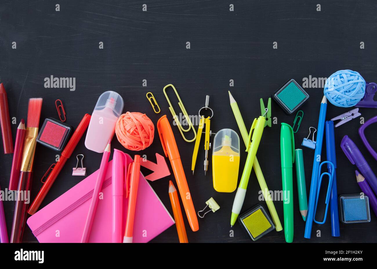 Colorful stationery on black background Stock Photo