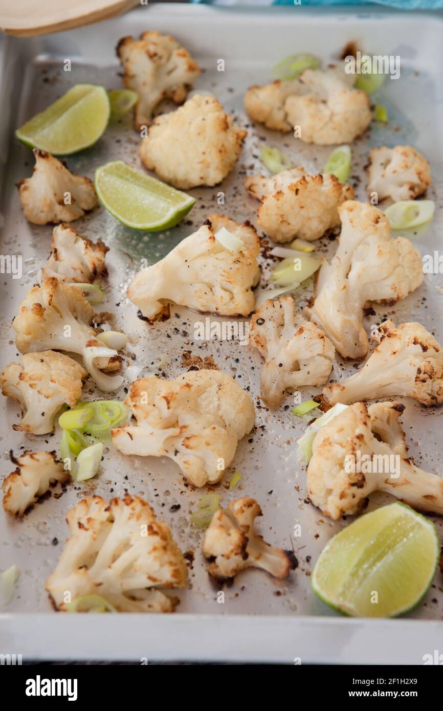 Baked cauliflower with lime Stock Photo Alamy