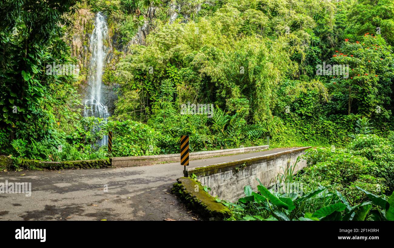 One Lane Bridge and Wailua Falls on The Hana Highway, Maui, Hawaii, USA Stock Photo
