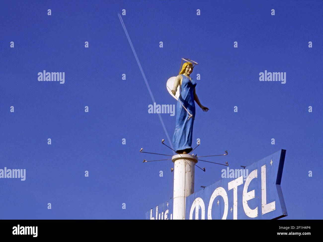 Sign for the Blue Angel Motel with three dimensional figure in Las Vegas, Nevada Stock Photo