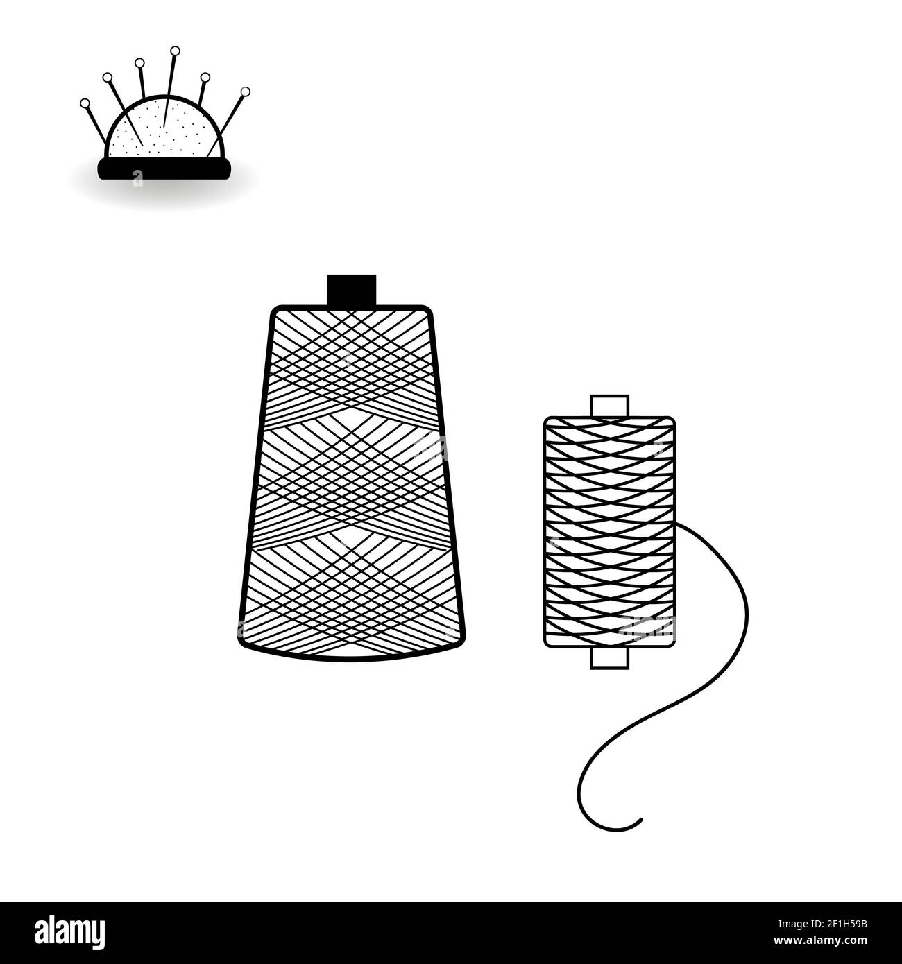 Spools of thread and needle bed Stock Photo Alamy