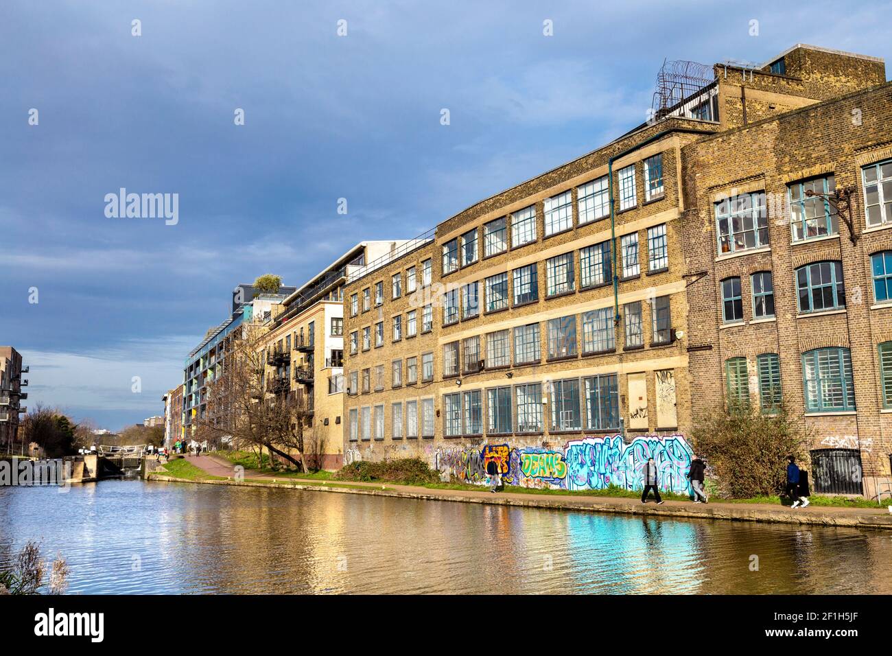Converted warehouses facing the Regents Canal in Stepney, Tower Hamlets, London, UK Stock Photo