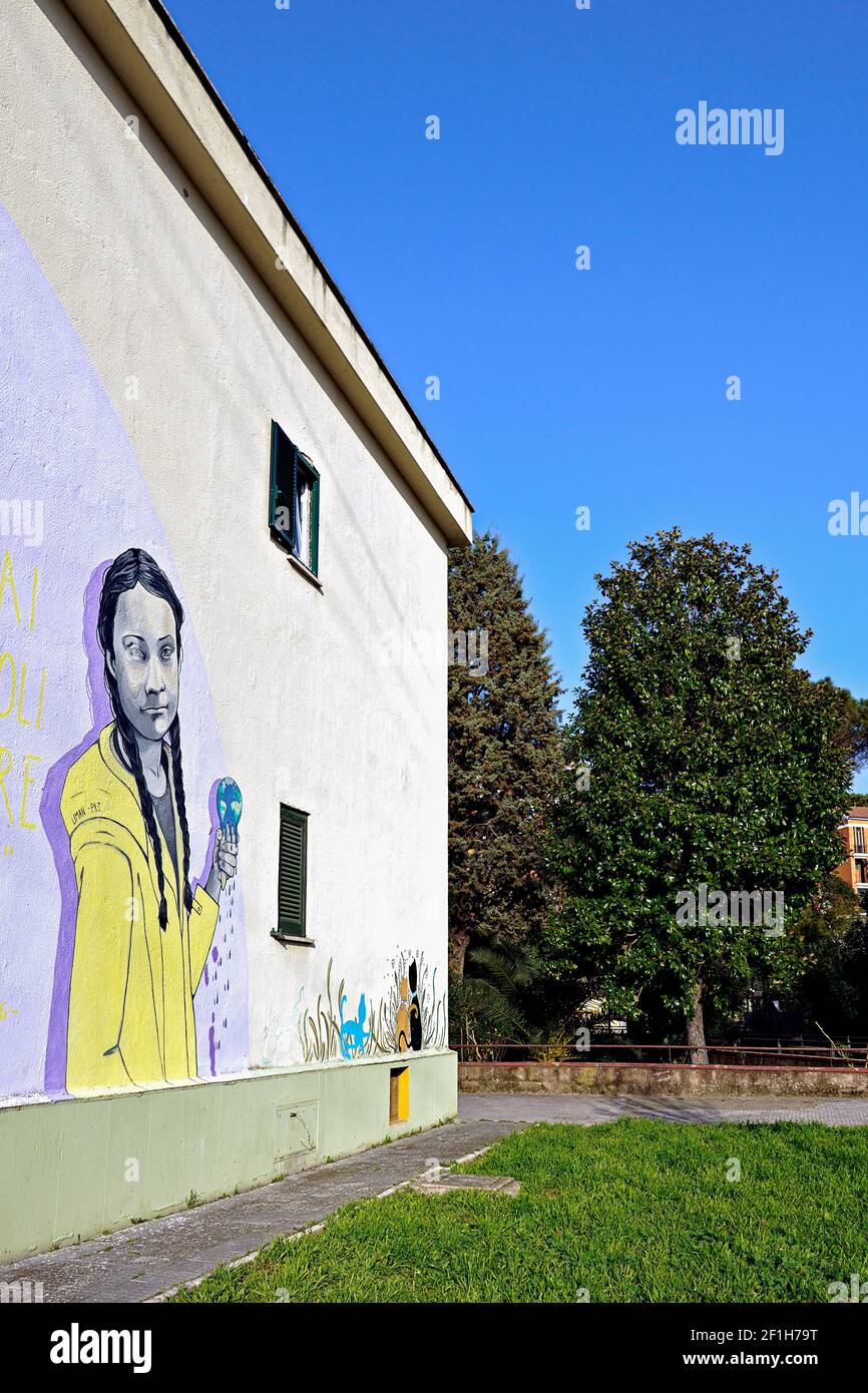 Greta Thunberg, climate change young activist, mural on the wall of a house in the Trullo district. Rome, Italy, Europe, EU Stock Photo