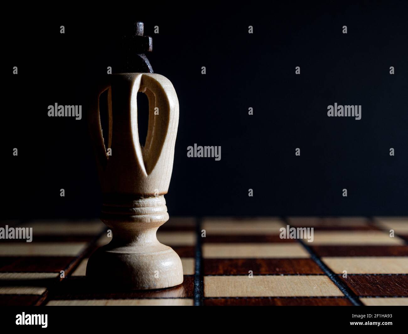 Chess King. A wooden chess piece photographed in a low key style Stock ...