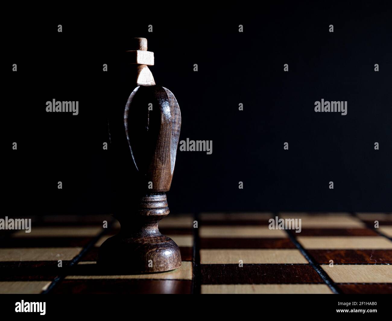 Chess King. A wooden chess piece photographed in a low key style Stock ...