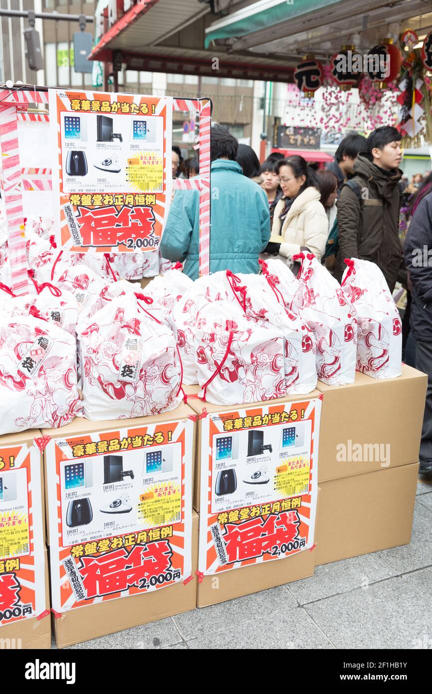 A shop selling mystery bags, or grab bags in the tradition of fukubukuro,  during New Years in Tokyo Stock Photo