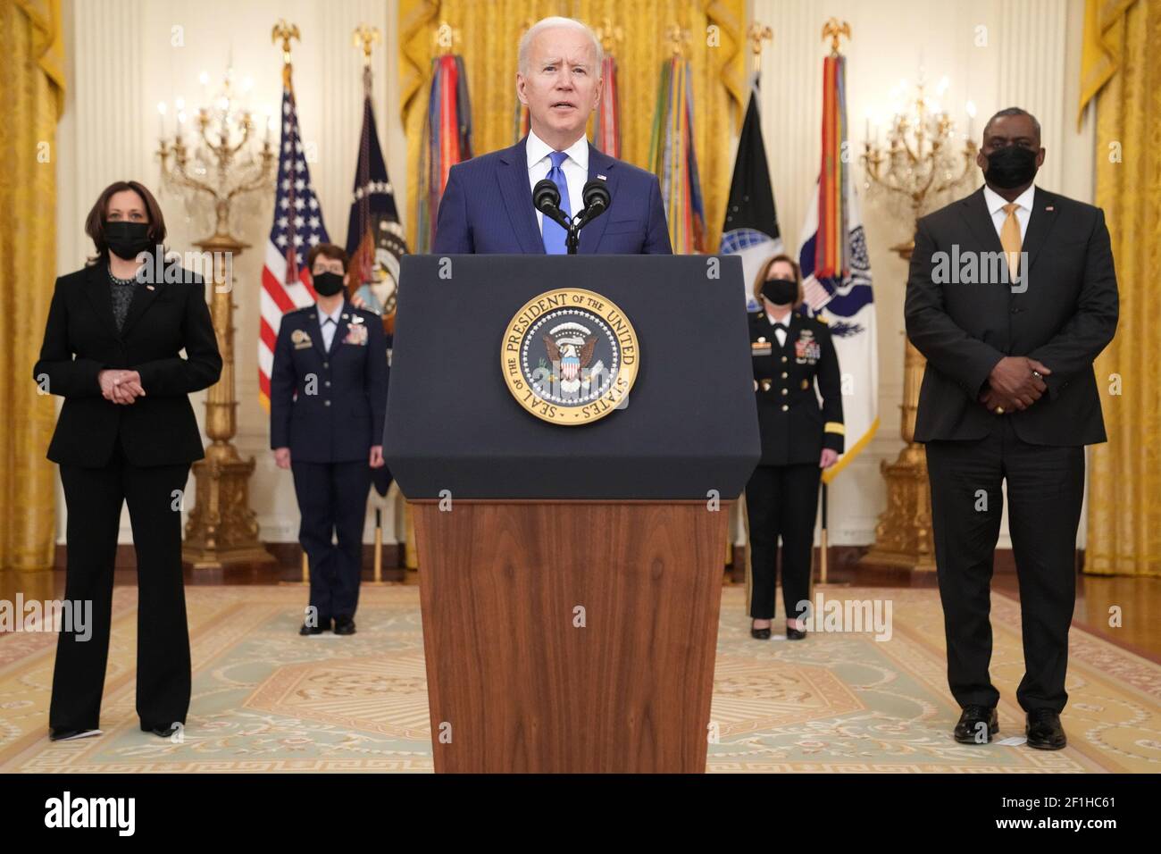 Washington, United States. 08th Mar, 2021. President Joe Biden delivers remarks at a Combatant Commander nomination event for, Air Force Gen. Jacqueline Van Ovost and Army Lt. Gen. Laura Richardson in the East Room at the White House in Washington, DC on Monday, March 8, 2021. Ovost, has been nominated to lead the Transportation Command and Richardson, has been nominated to lead military activities in Latin America at Southern Command. Biden was joined by Vice President Kamala Harris and Defense Secretary Lloyd Austin. Photo by Kevin Dietsch/UPI Credit: UPI/Alamy Live News Stock Photo