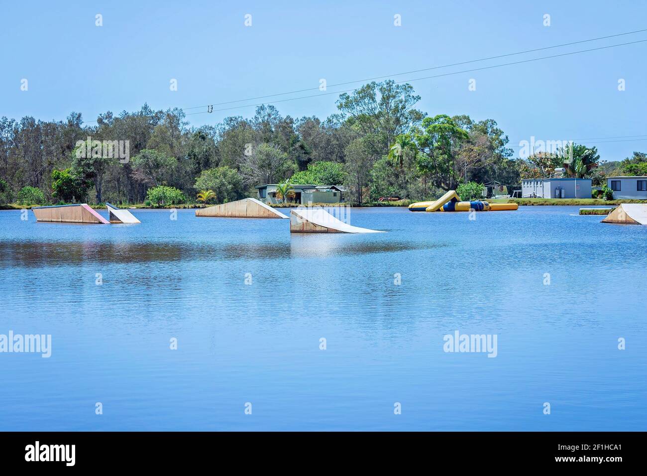 Jump ramps at a cable wakeboard park Stock Photo Alamy