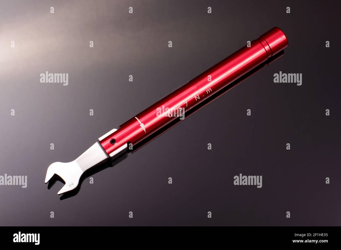 Professional torque wrench for accurate coaxial SMA connector tighten with calibrated torque isolated on the black background Stock Photo