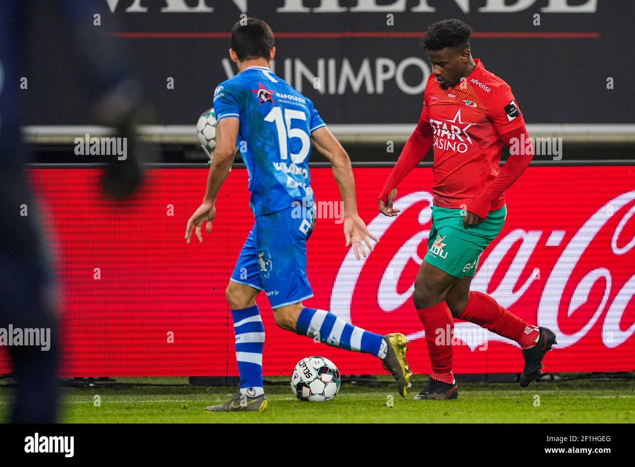GENT, BELGIUM - MARCH 8: Mamadou Thiam of KV Oostende and Milad Mohammadi of KAA Gent during the Jupiler Pro League match between KAA Gent and KV Oost Stock Photo