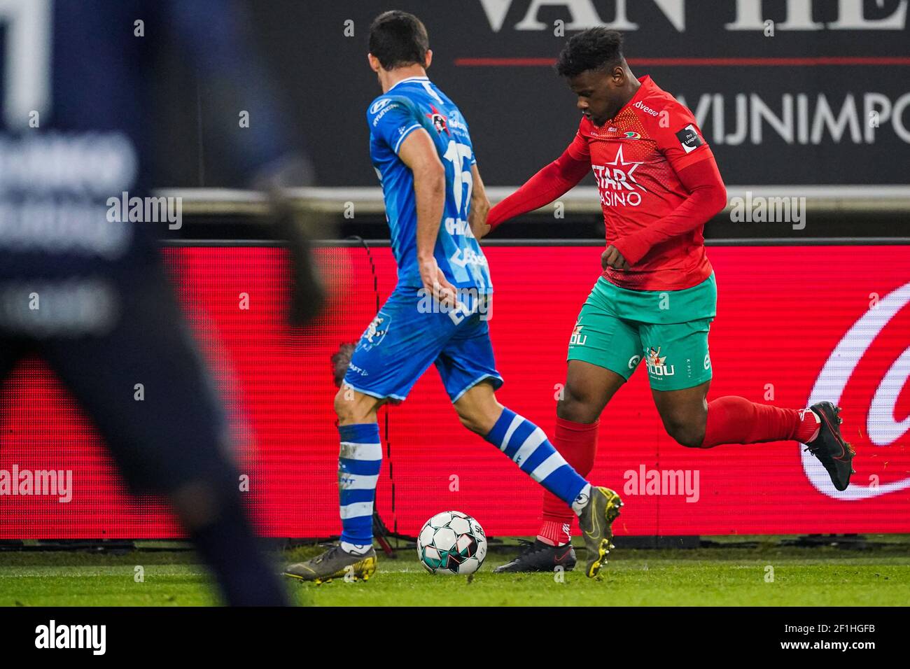GENT, BELGIUM - MARCH 8: Mamadou Thiam of KV Oostende and Milad Mohammadi of KAA Gent during the Jupiler Pro League match between KAA Gent and KV Oost Stock Photo