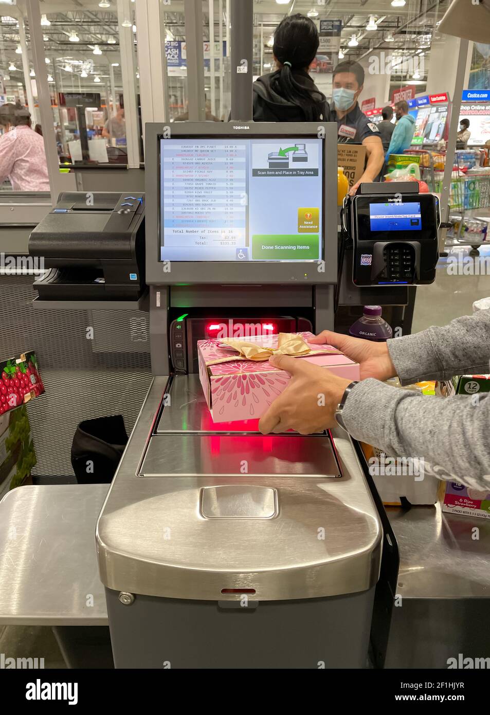 McKinney, TX USA - February 22, 2021: A close up view of a customer using a  kiosk at a newly opened self check out the area in Costco Stock Photo -  Alamy