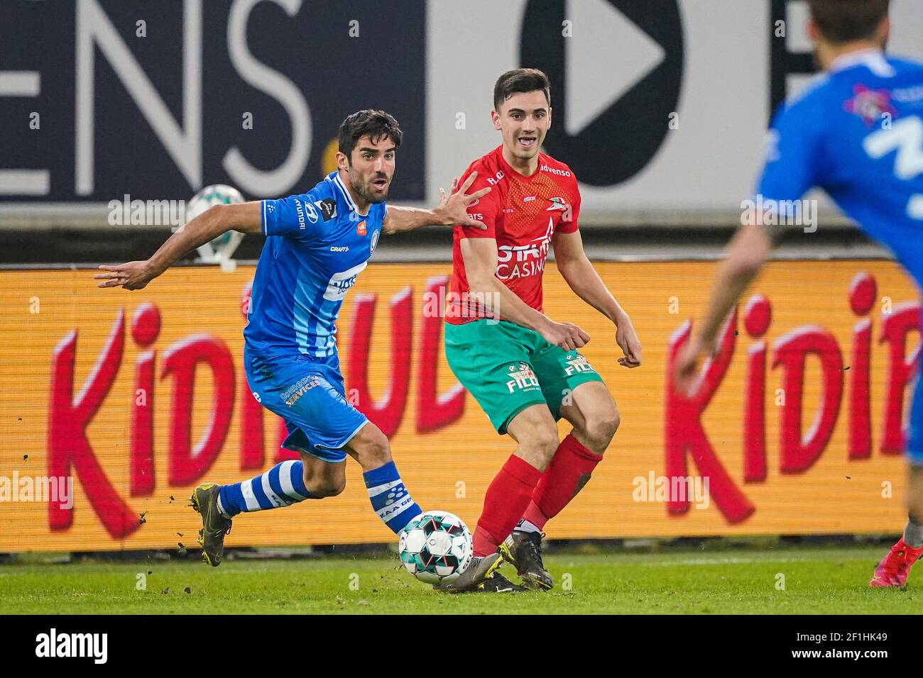 GENT, BELGIUM - MARCH 8: Milad Mohammadi of KAA Gent and Andrew Hjulsager of KV Oostende during the Jupiler Pro League match between KAA Gent and KV O Stock Photo
