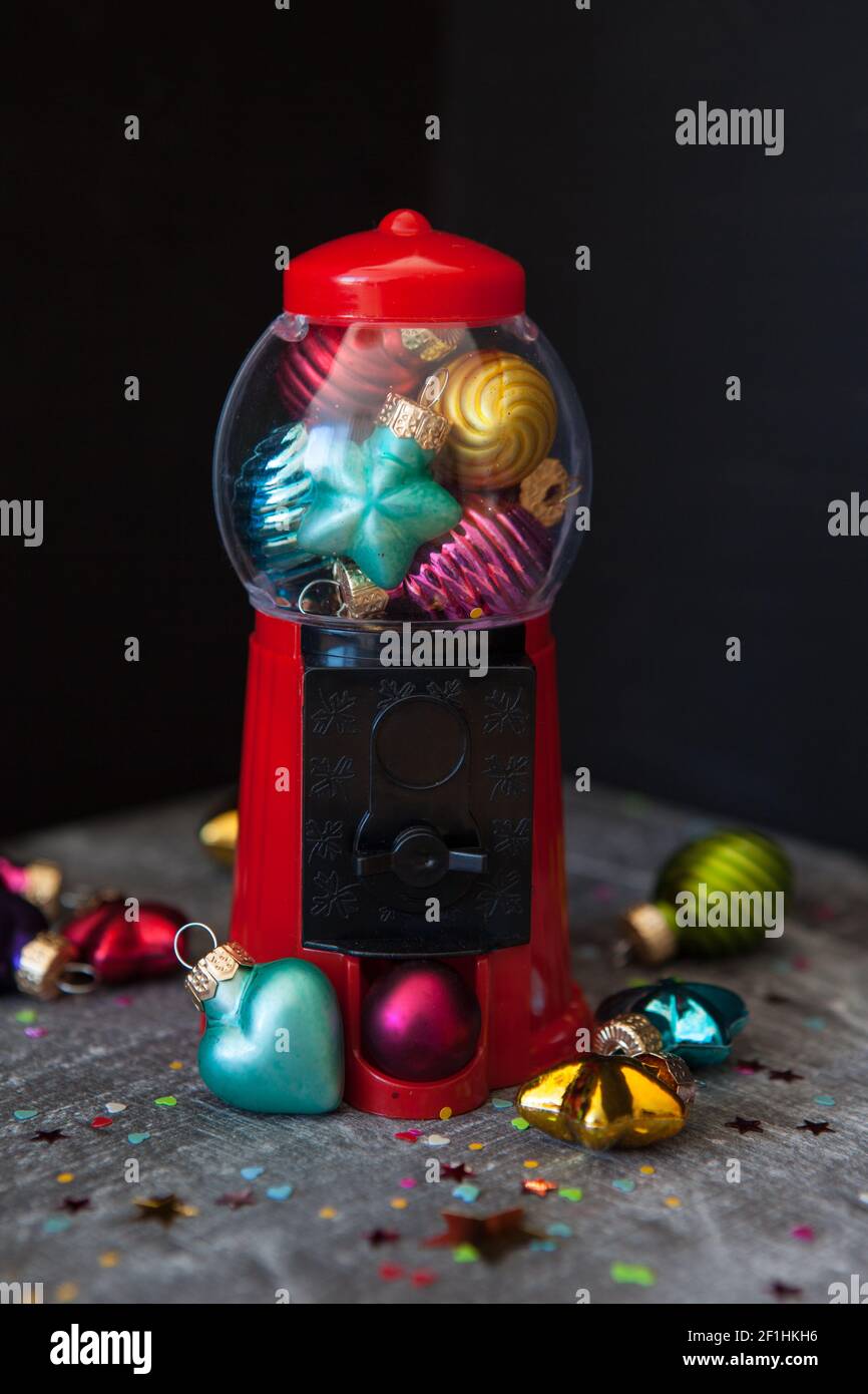 Chewing gum machine with christmas tree balls Stock Photo