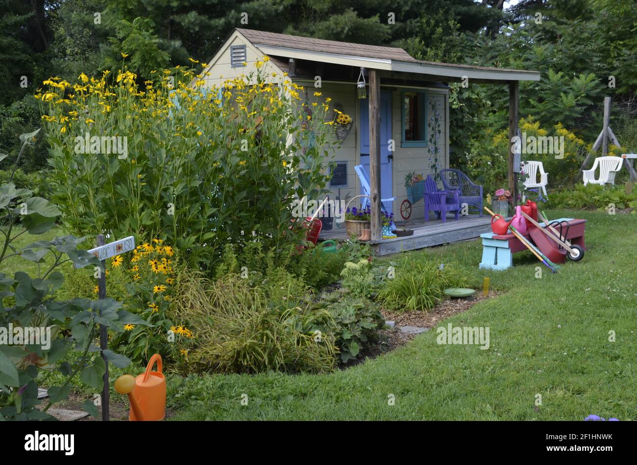Garden shed and tools in the community garden for children, summer, Yarmouth Maine USA Stock Photo