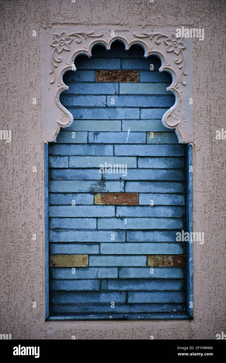 BRICKS SETUP IN WINDOW, WINDOW DESIGN, BRICKS BACKGROUND Stock Photo