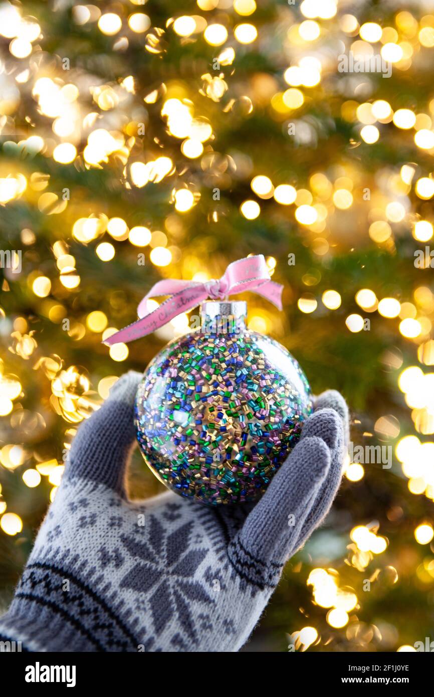 Colorful Christmas tree balls in front of lights Stock Photo - Alamy