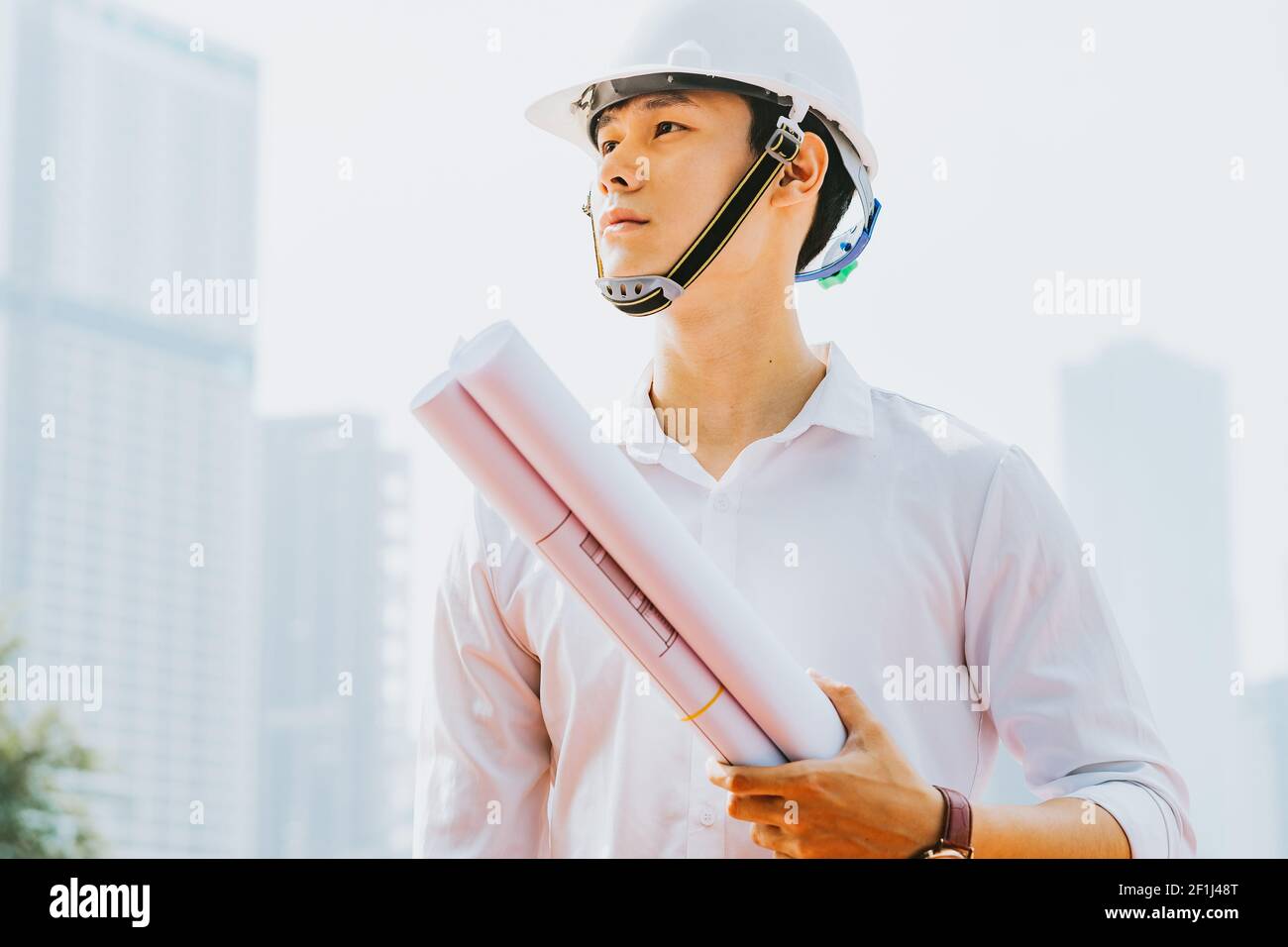 Asian construction engineers are doing experimental tests at the site Stock Photo
