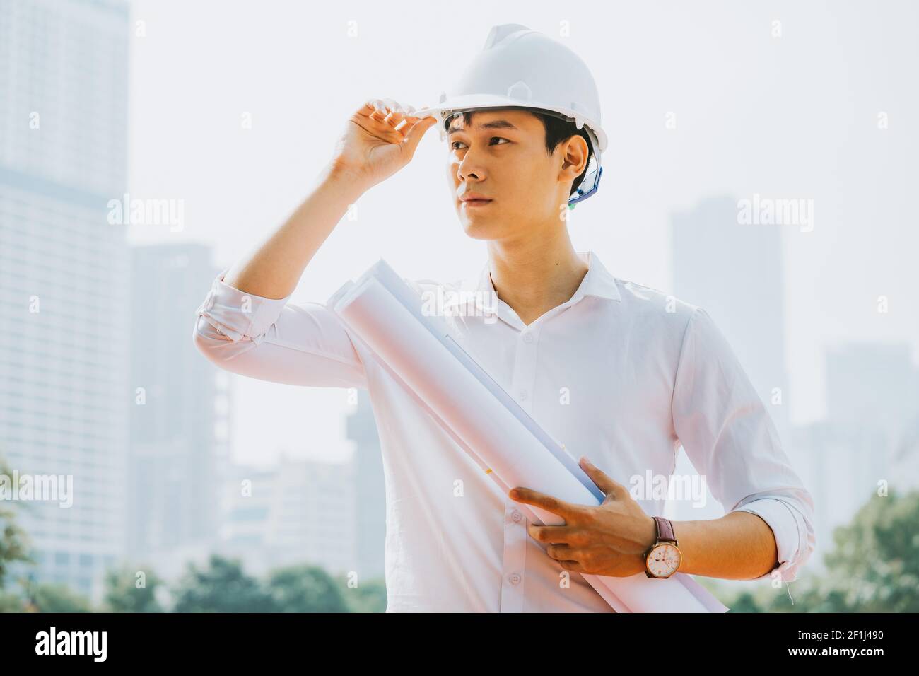 Asian construction engineers are doing experimental tests at the site Stock Photo