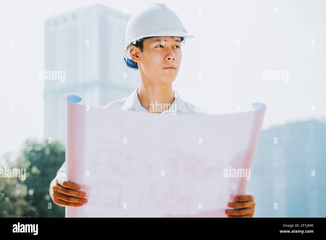 Asian construction engineers are doing experimental tests at the site Stock Photo