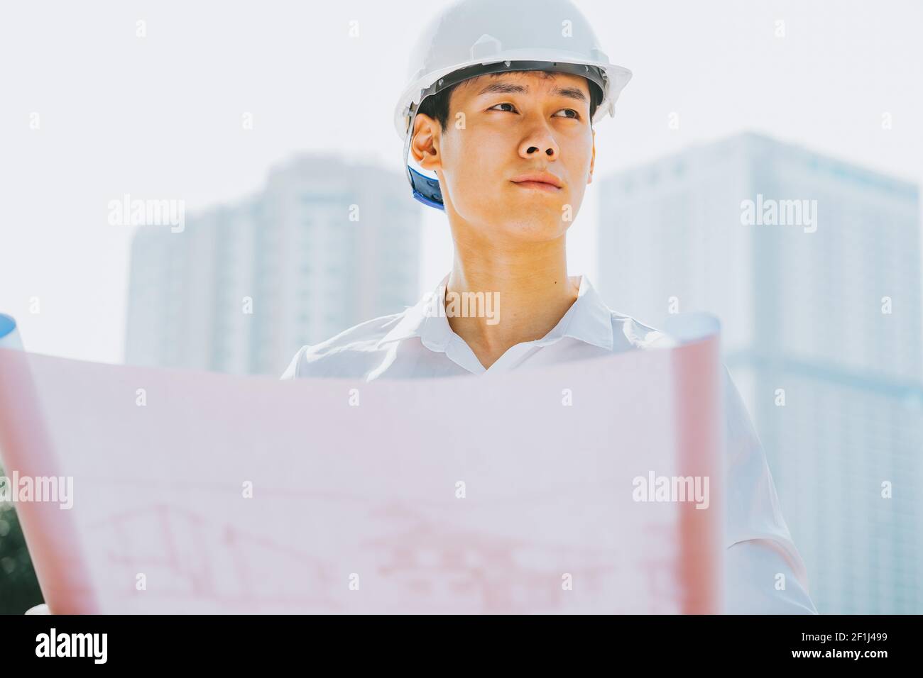 Asian construction engineers are doing experimental tests at the site Stock Photo