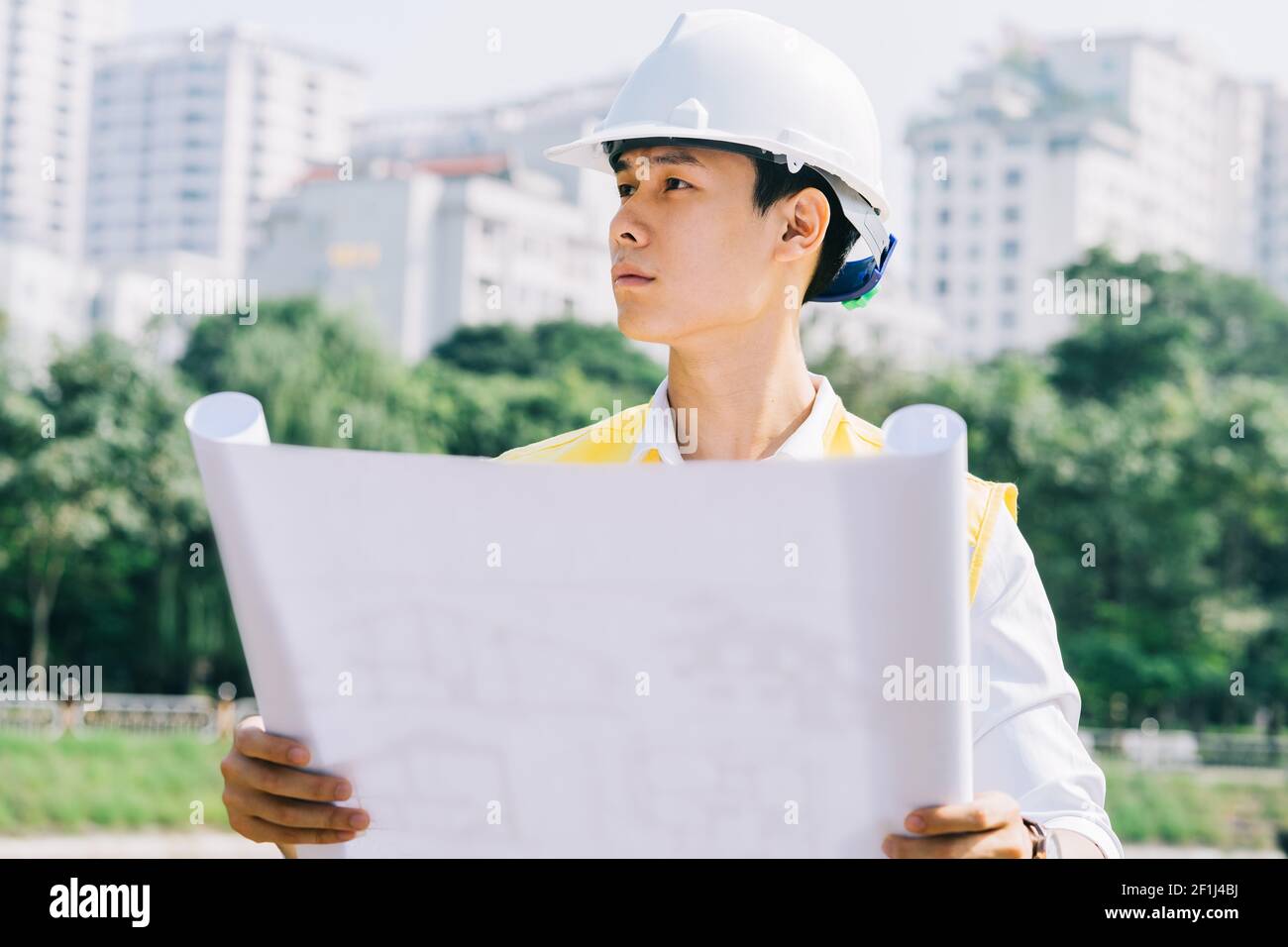 Asian construction engineers are doing experimental tests at the site Stock Photo