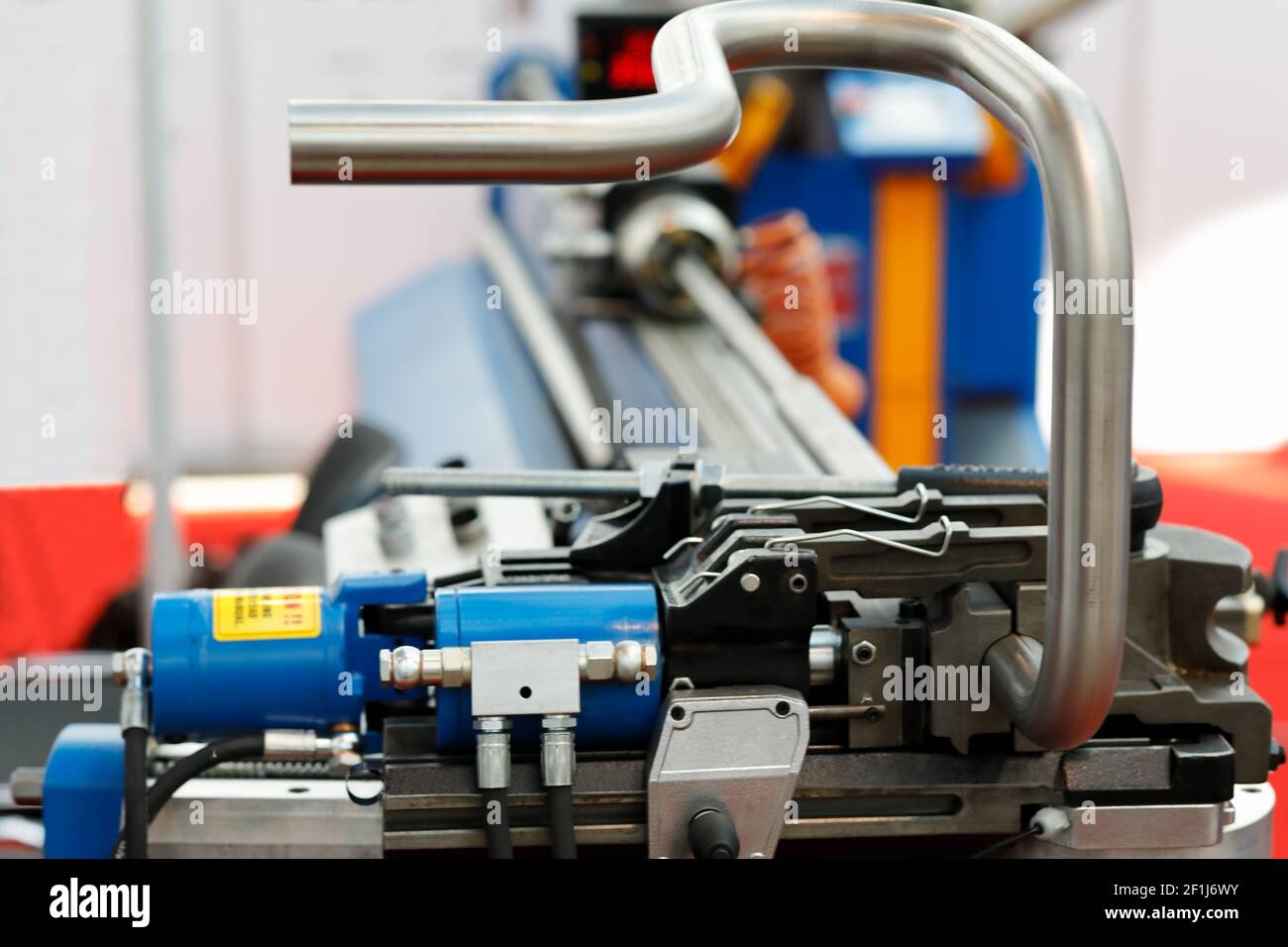 Industrial CNC pipe bending machine close up. Selective focus. Stock Photo