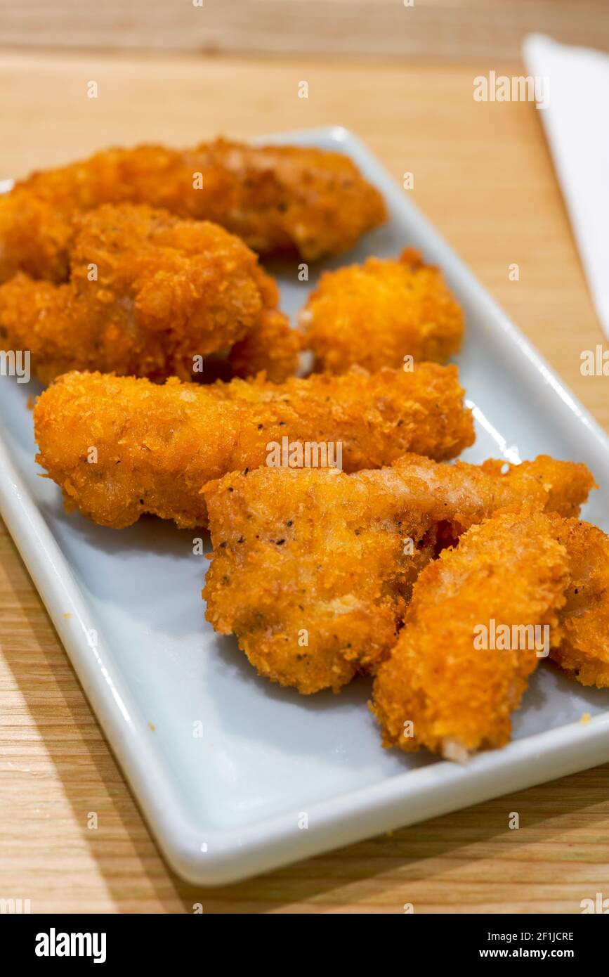 A golden and tempting deepfried fish steak Stock Photo Alamy