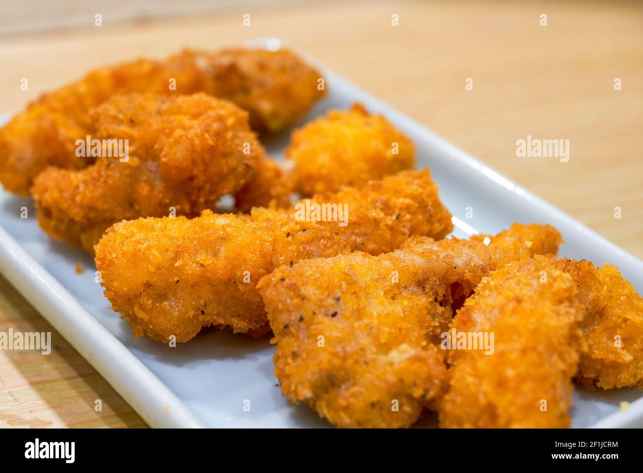 A golden and tempting deepfried fish steak Stock Photo Alamy