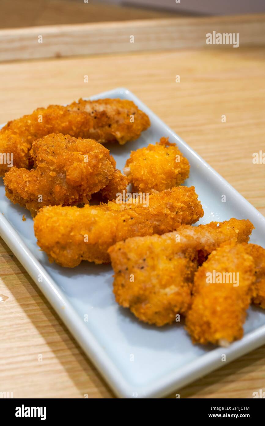 A golden and tempting deepfried fish steak Stock Photo Alamy