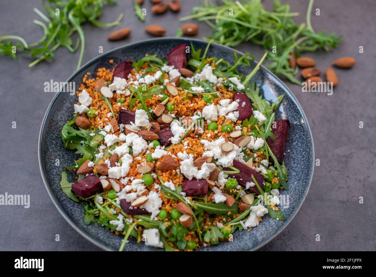 healthy home made couscous salad with sweet potato, beetroot and feta cheese Stock Photo