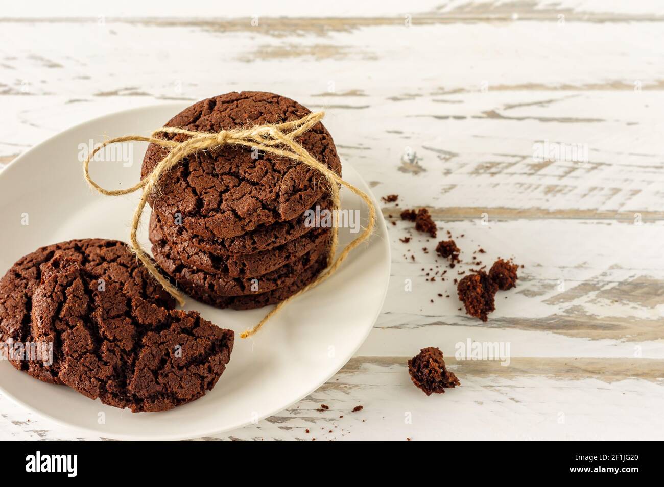 Chocolate chip cookies on a plate. Stack of homemade american traditional cookies. Homemade baking. Stock Photo