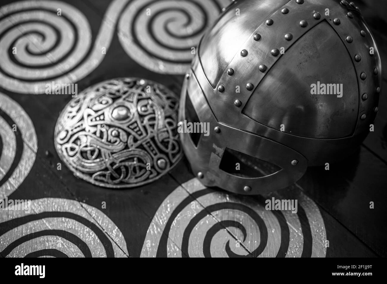 Traditional Vikings, viking helmet with chain mail on a red shield with