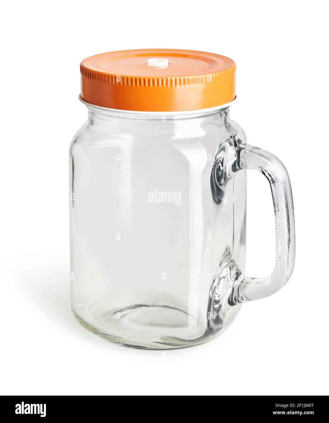 Empty glass mason jar for canning and preserving beverages with orange lid isolated on white background with clipping path (the shadow is not included Stock Photo