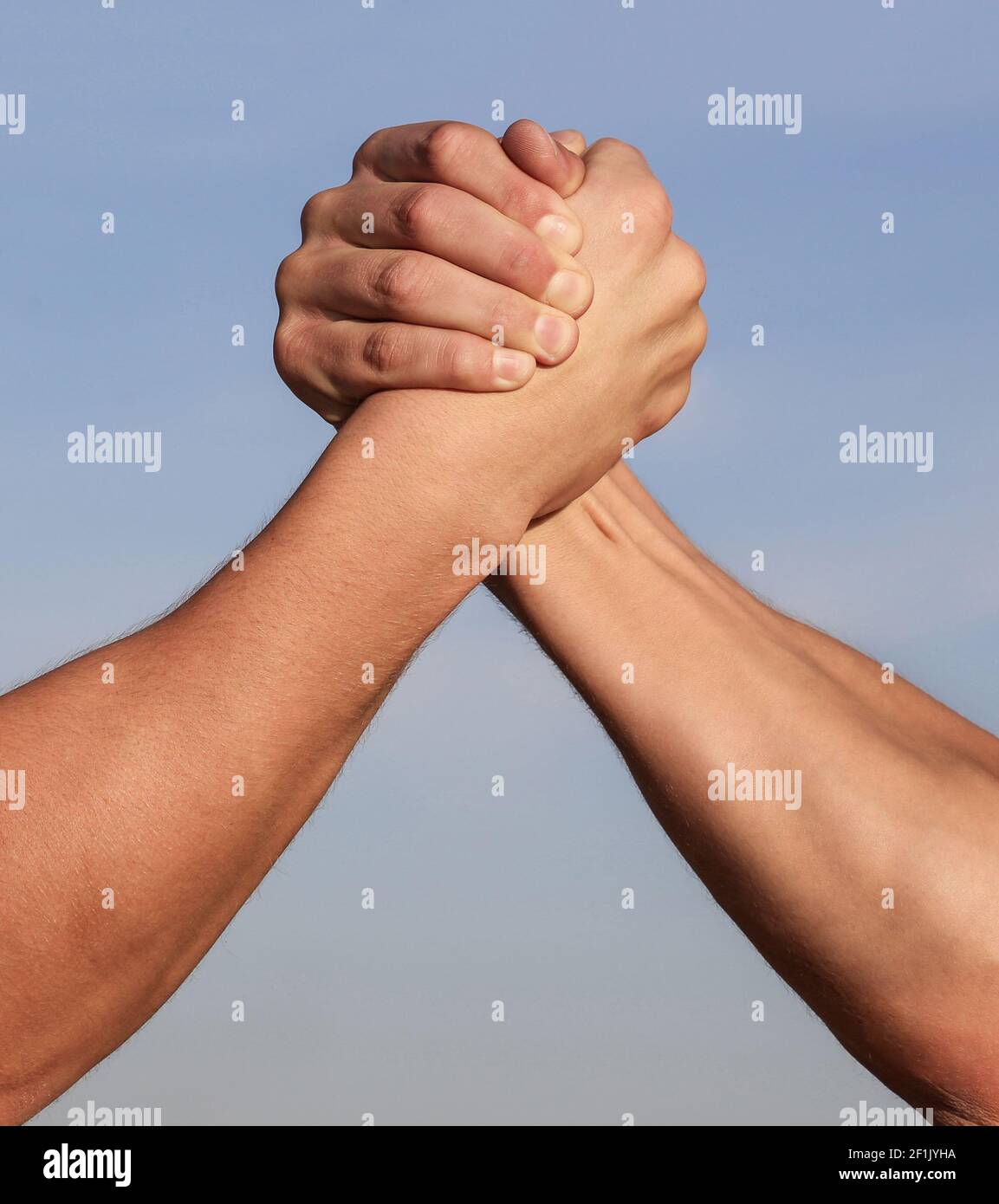 Hand rivalry vs challenge strength comparison. Man hand. Two men arm wrestling. Arms wrestling