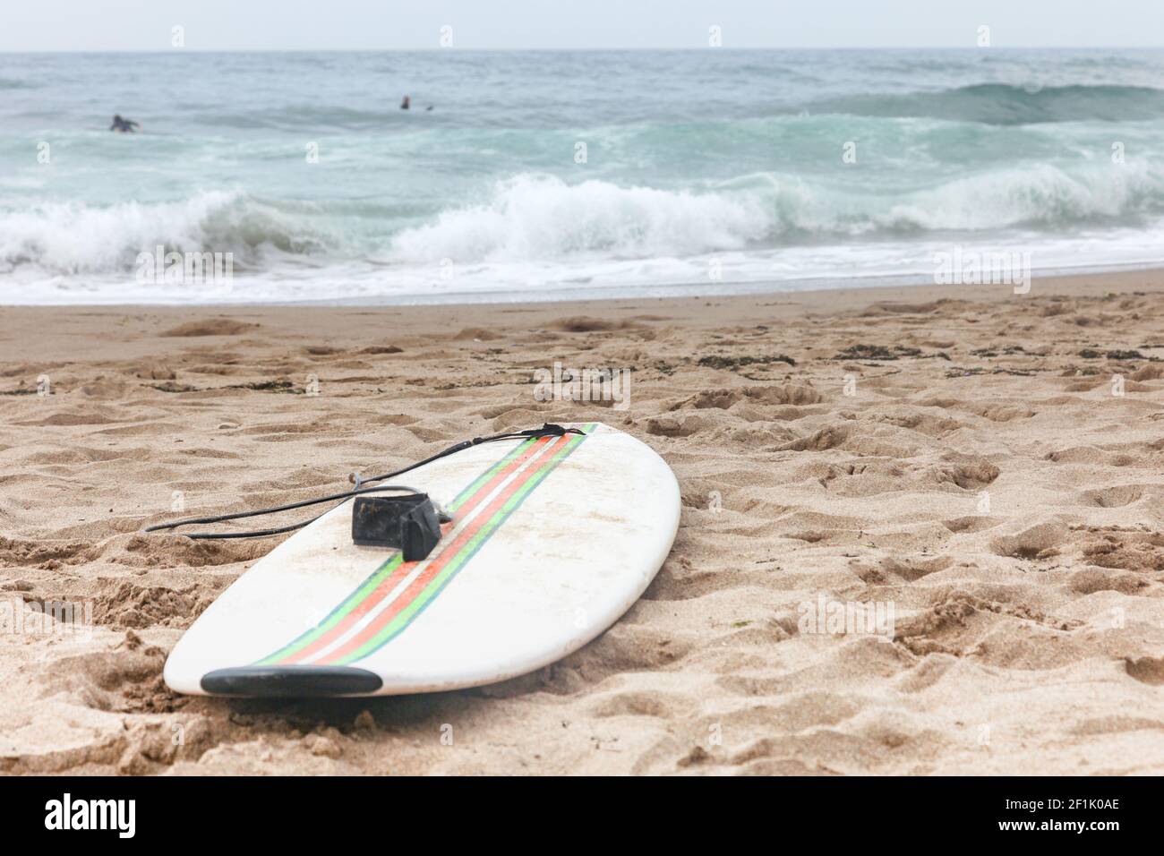 Surfboards lying on sand ocean beach background Stock Photo Alamy