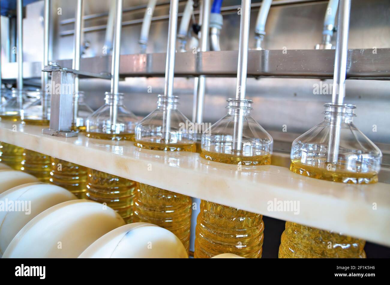 Sunflower oil. Factory line of production and filling of refined oil