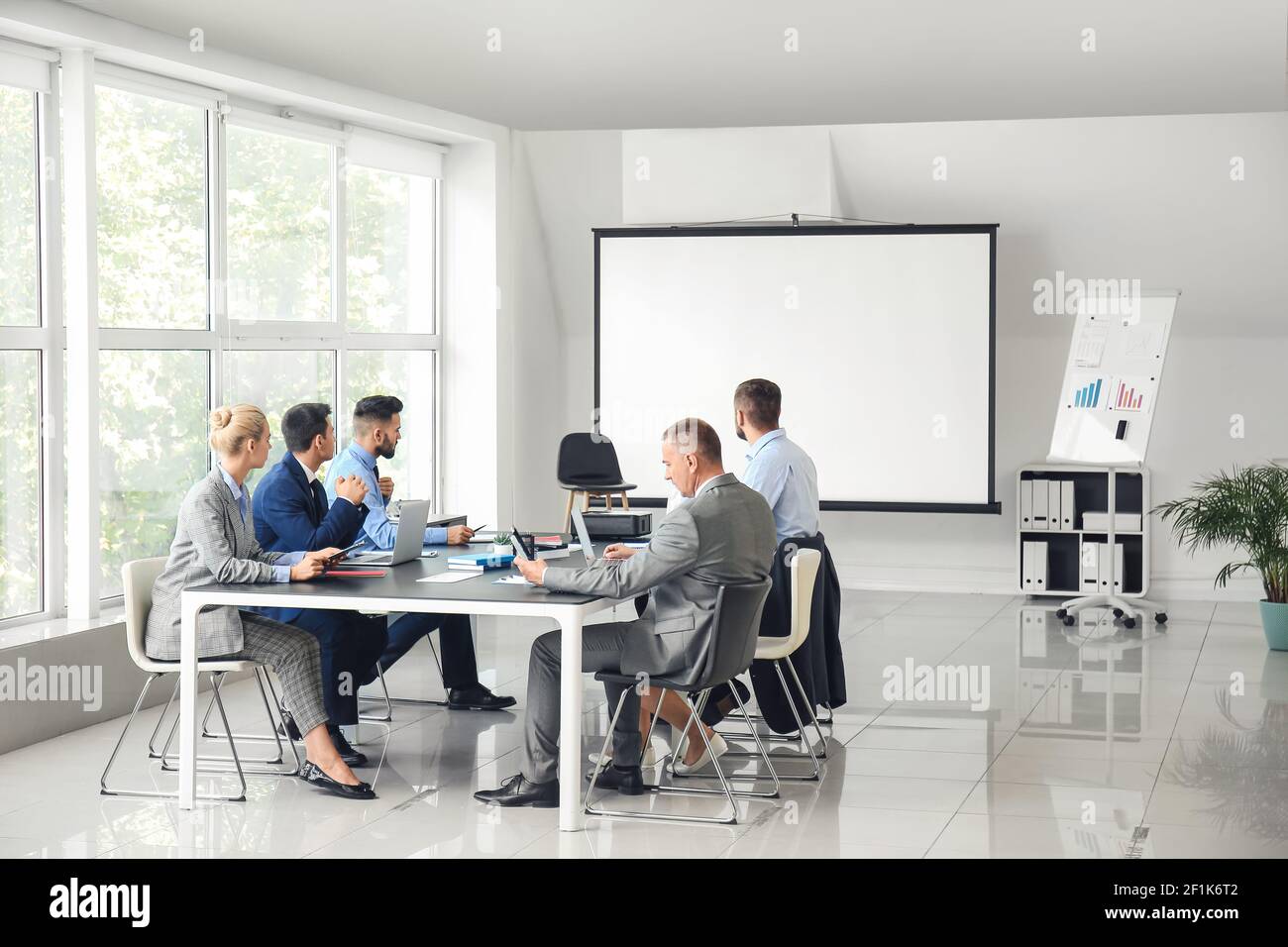 Business people having meeting in office Stock Photo - Alamy