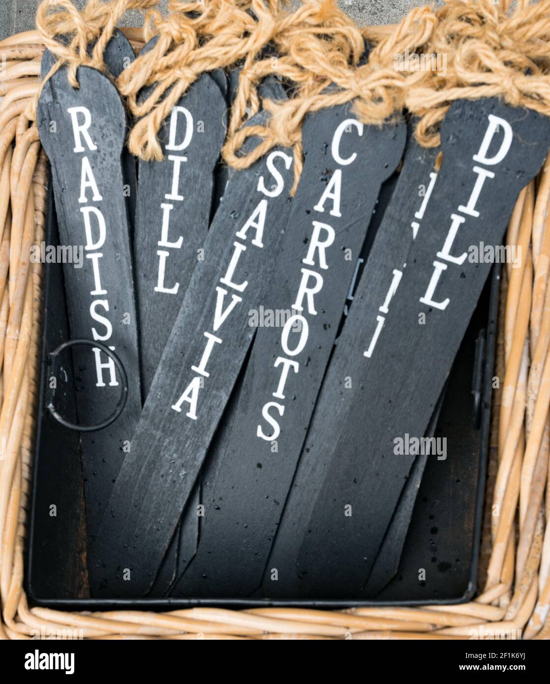 Black slate name tags for vegetables and herbs for labelling in the