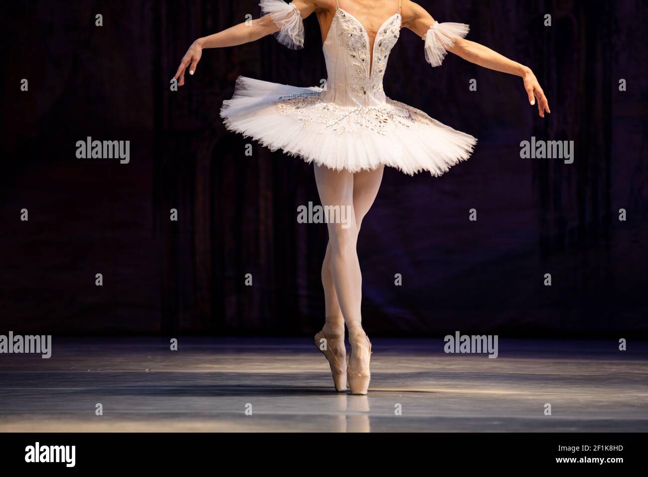 Closeup of ballerina dancing isolated on stage. Ballerina legs closeup  Stock Photo - Alamy