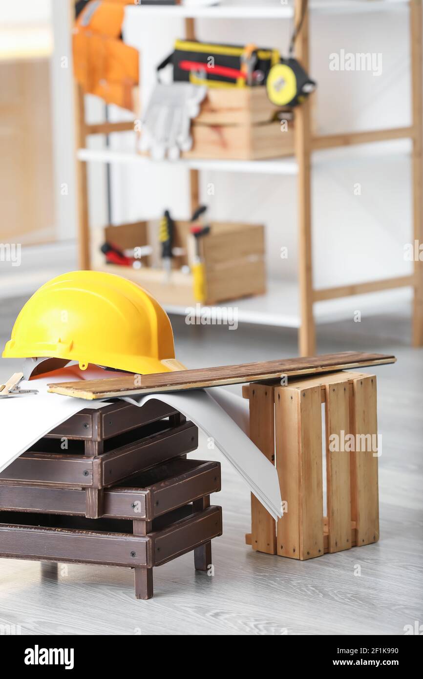Rack with construction tools in workshop Stock Photo - Alamy
