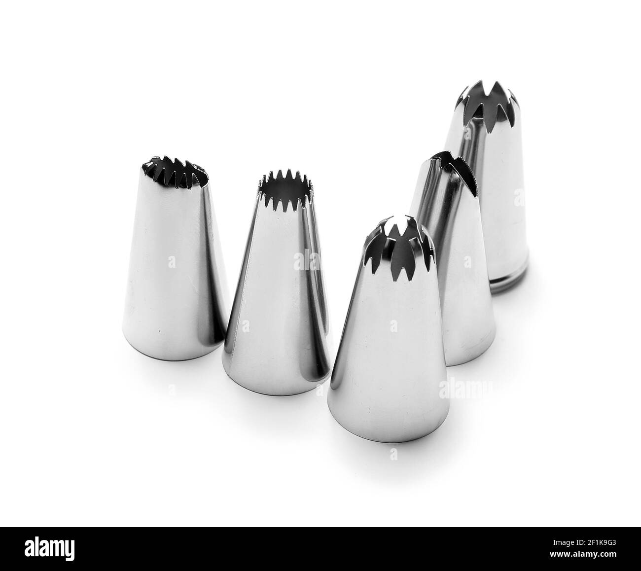 Different piping tips on white background Stock Photo Alamy