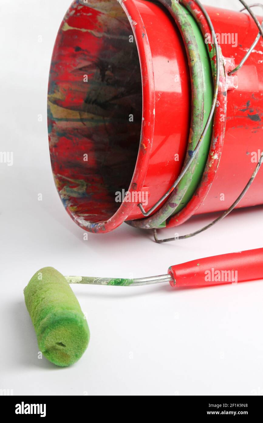 Paint roller and bucket in front of white background Stock Photo Alamy