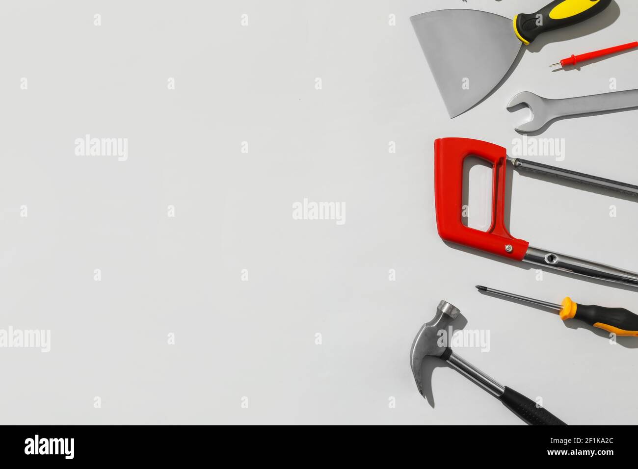 Set of construction tools on light background Stock Photo - Alamy