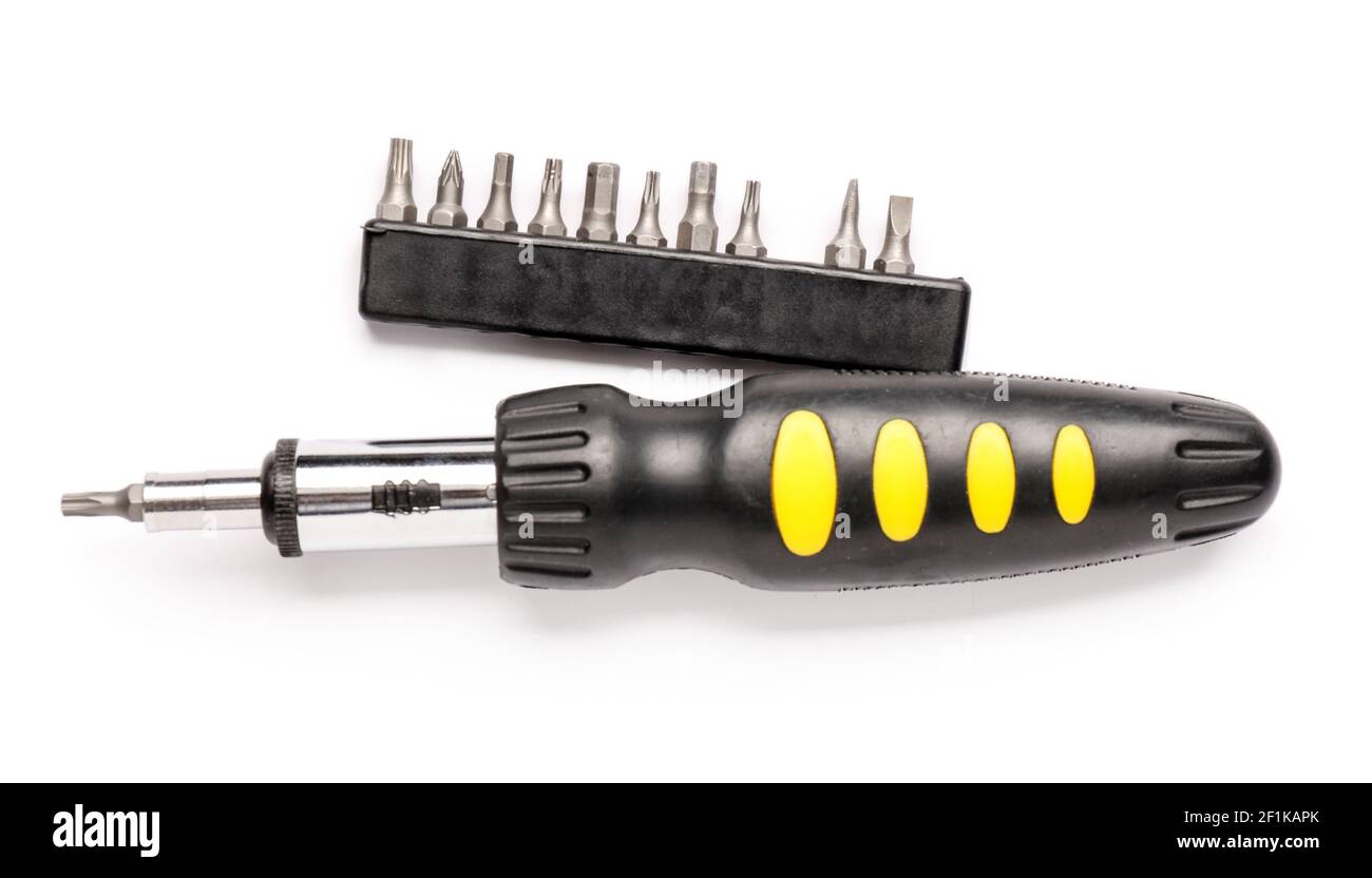 Screwdriver with bits on white background Stock Photo